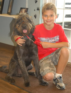 Smileing customer with the happiest dog